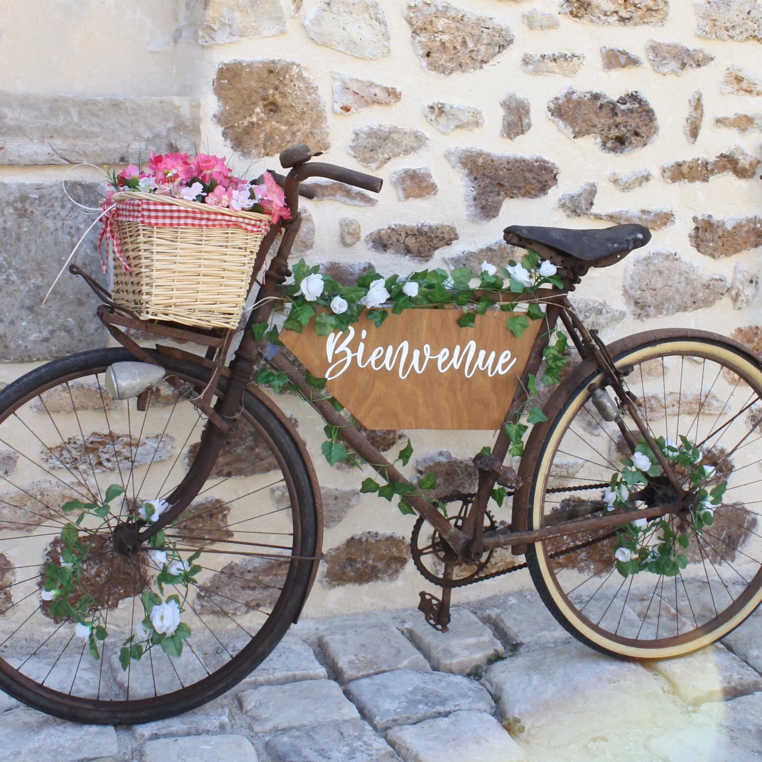 vélo vintage avec panneau en bois Bienvenue